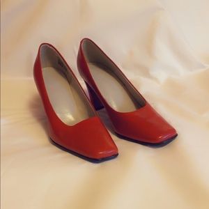 Allure heels in the style “square toe pumps”.